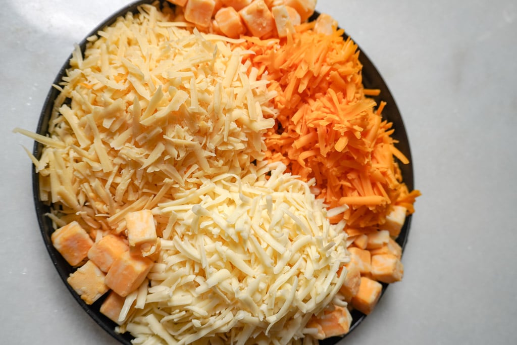 cheeses used for lobster mac and cheese include smoked gouda, sharp cheddar, monterey jack, and colby jack