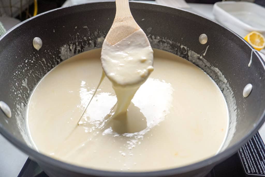 cheese sauce in a skillet for lobster mac and cheese