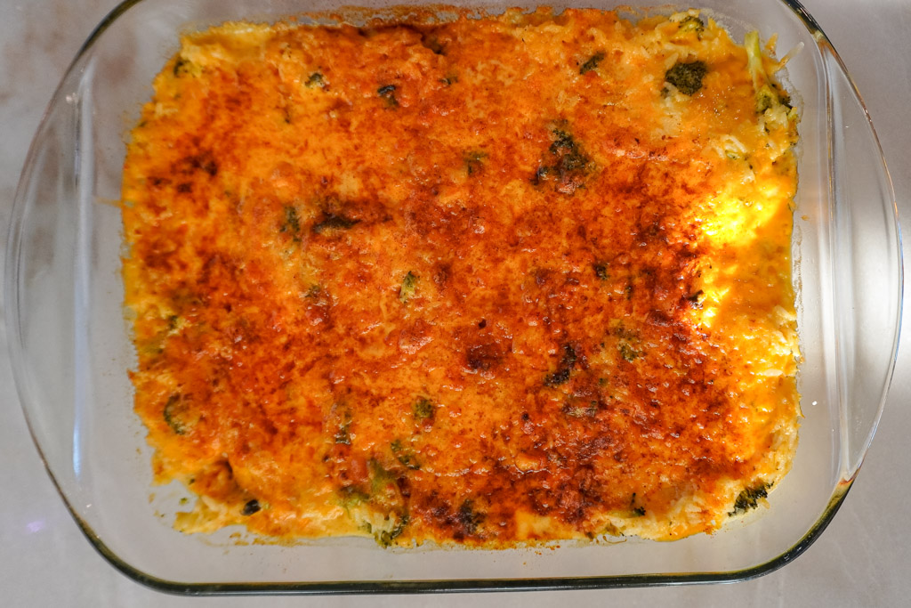 pan full of baked cheddar broccoli rice