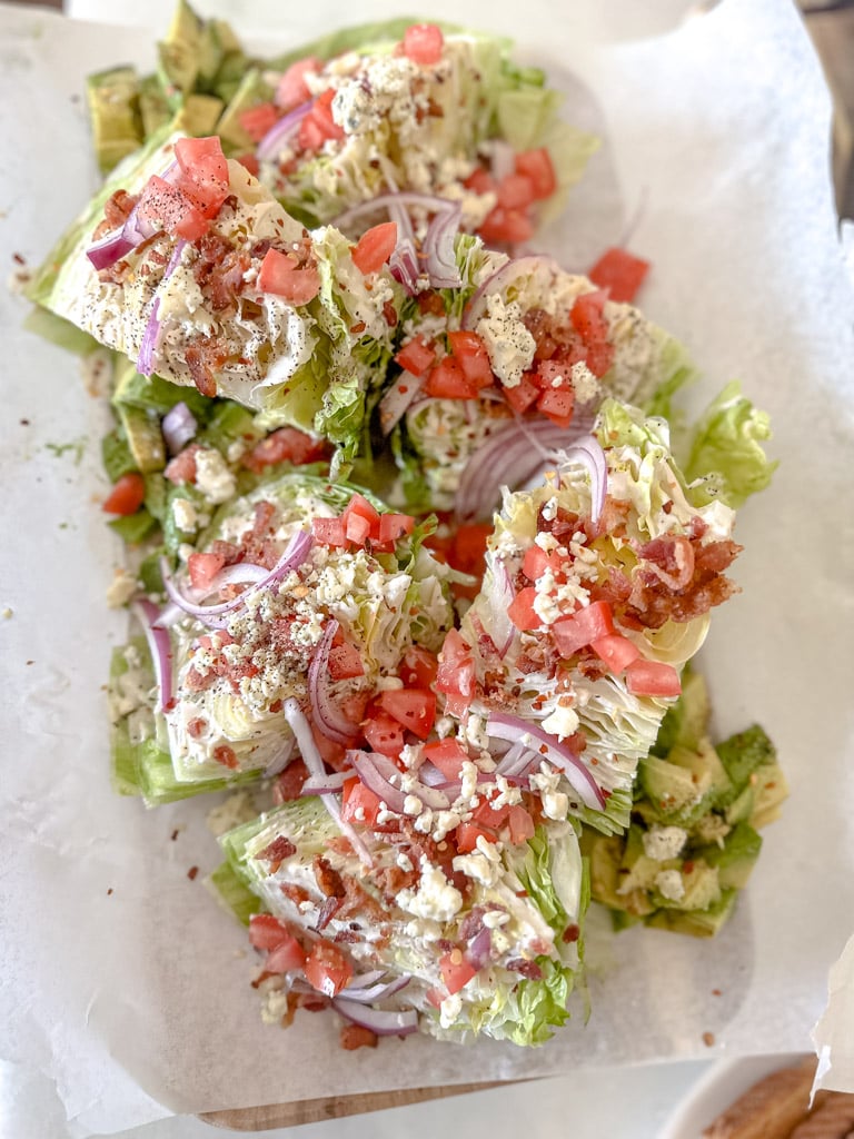 wedge salad on top of parchment paper