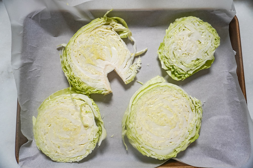 raw sliced cabbage on parchment paper