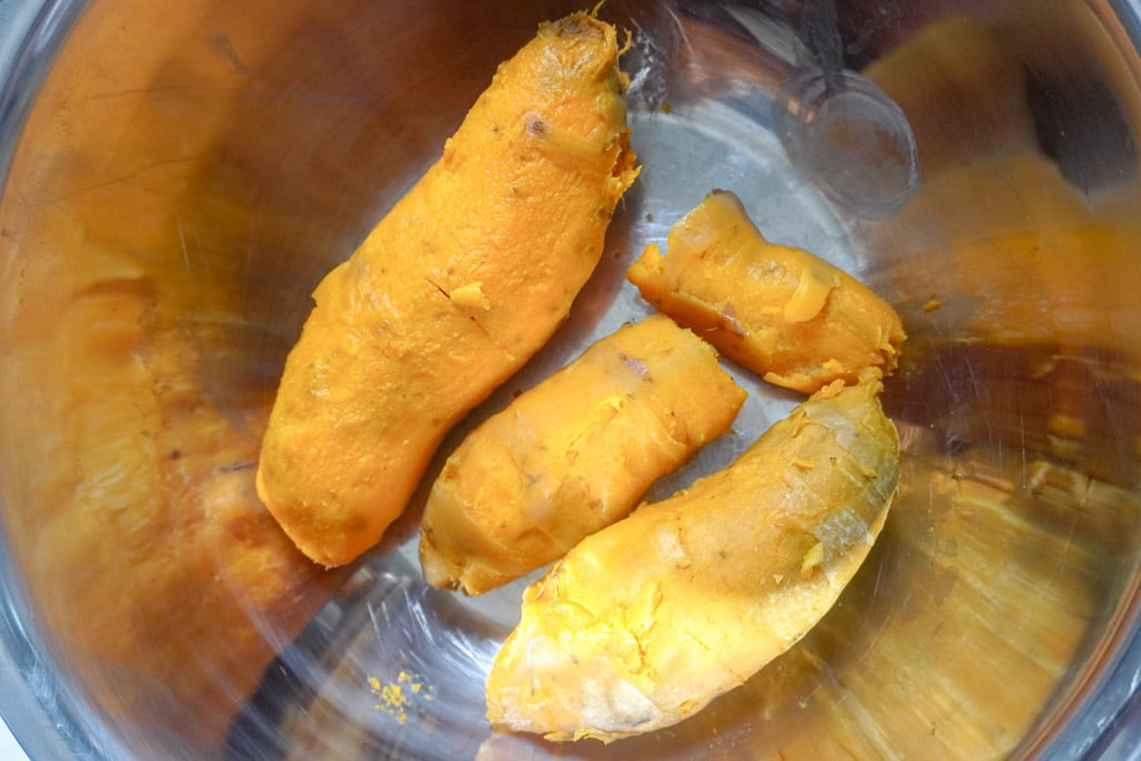 peeled and cooked sweet potatoes in a bowl