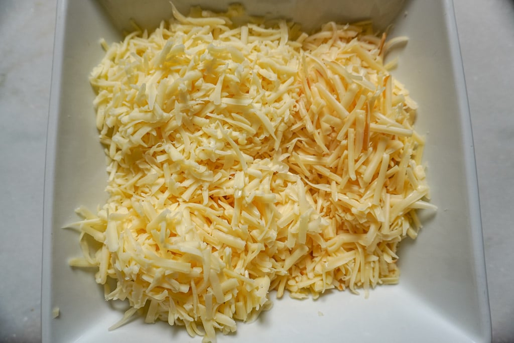 freshly shredded cheese in a plate
