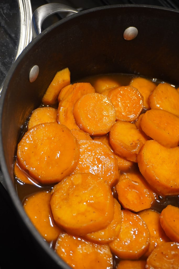 preparing candied sweet potatoes on the stovetop