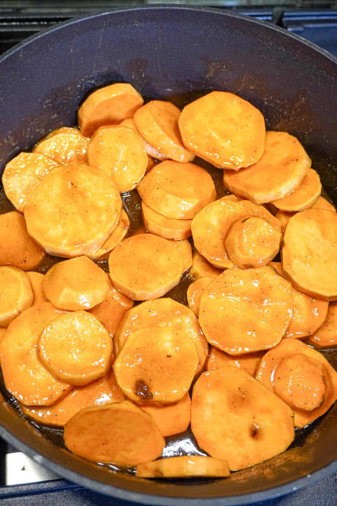 preparing candied yams on the stovetop