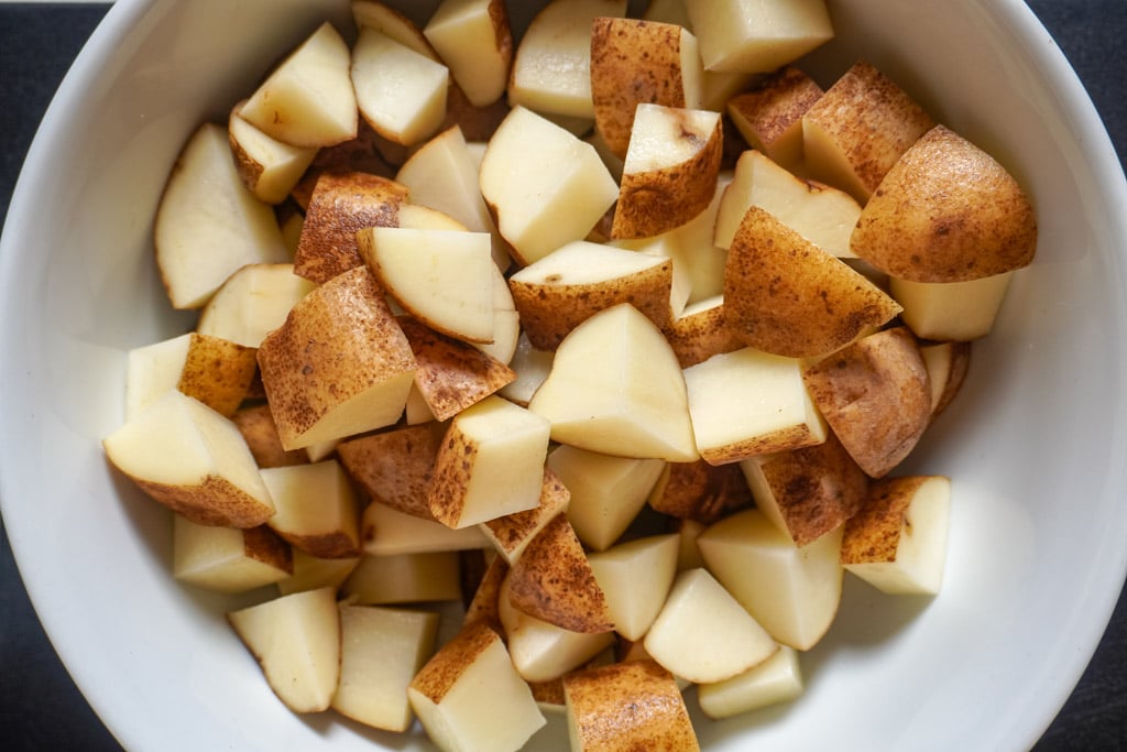 russet potatoes diced in a bowl