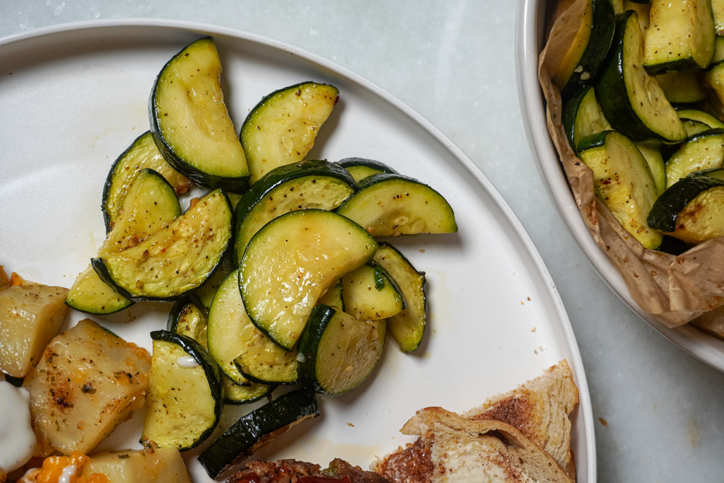 close up view of cooked zucchini in a plate