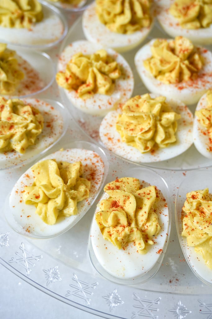 close up view of best deviled eggs recipe on a tray