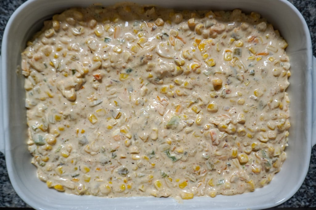 corn dip mixture in a casserole dish prior to baking