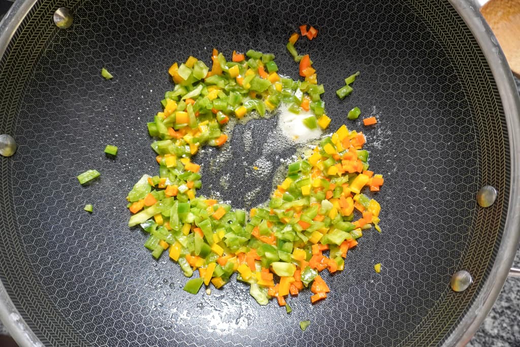 sauteed peppers in a skillet