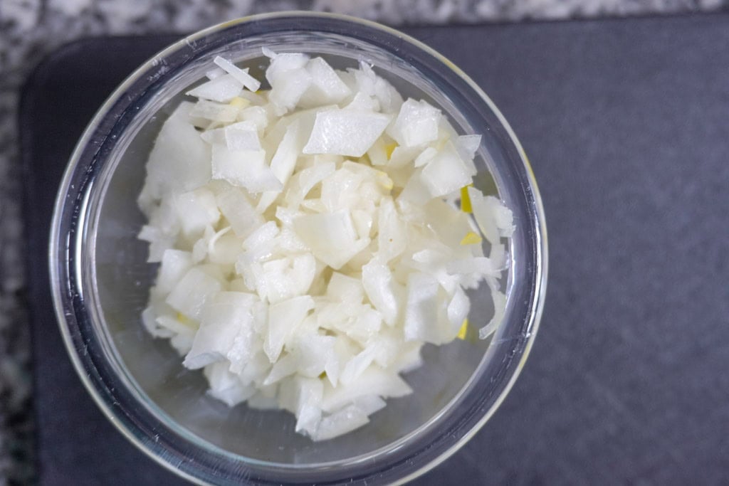 diced onions in a small bowl