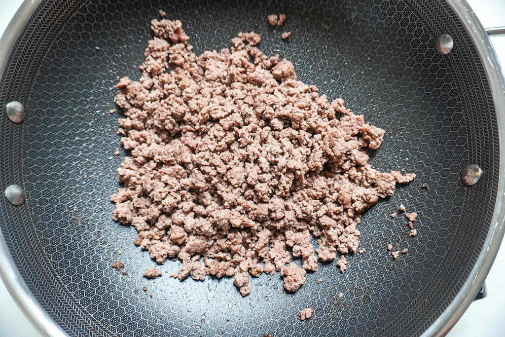 browned ground beef in a skillet