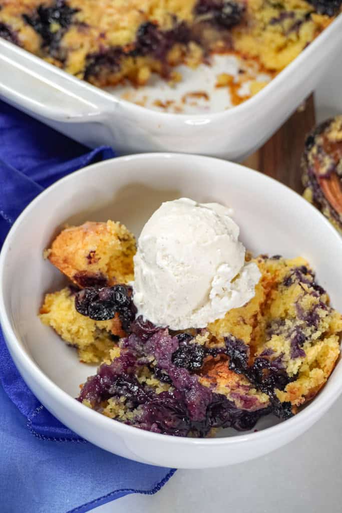 A bowl of blueberry cobbler.