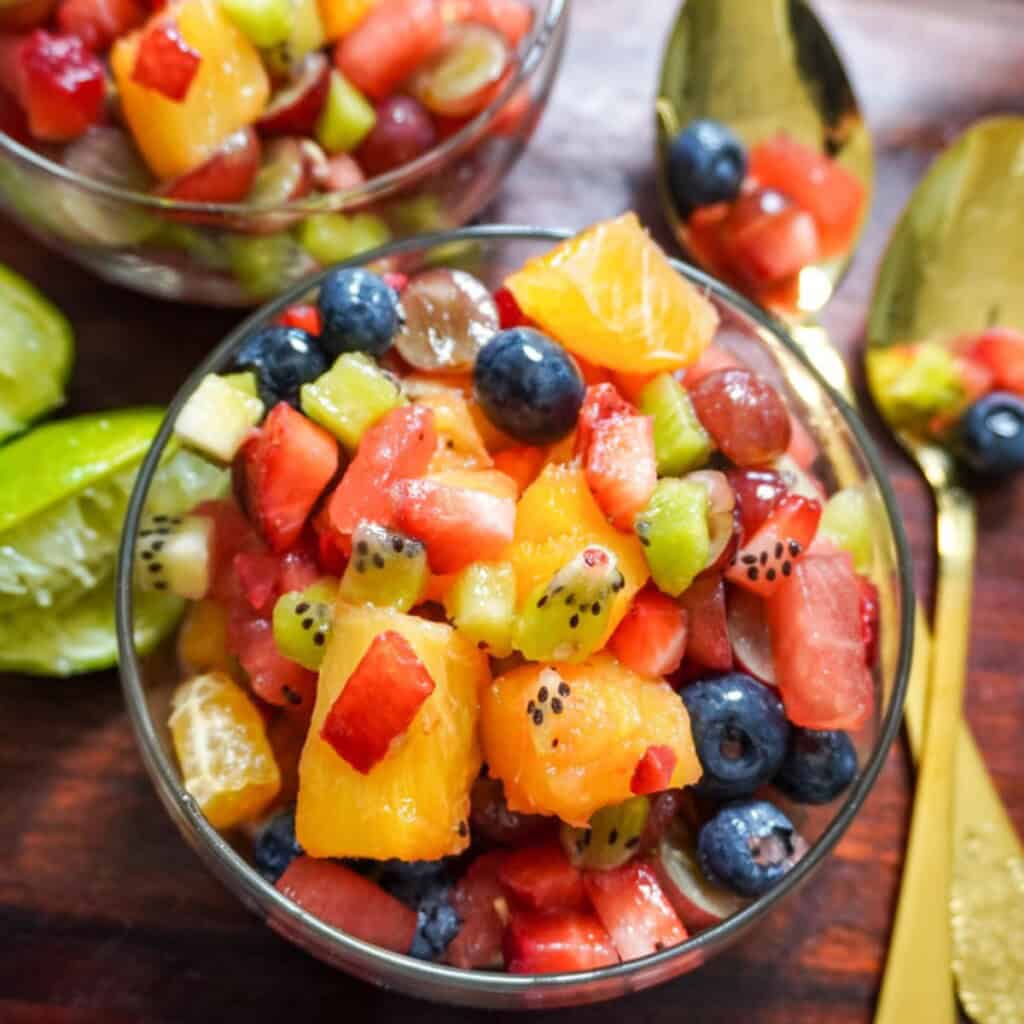 a glass bowl of fruit salad