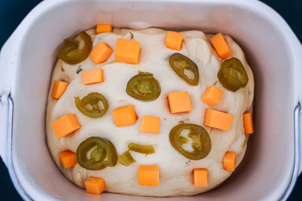 jalapeno cheddar bread dough in a bread maker