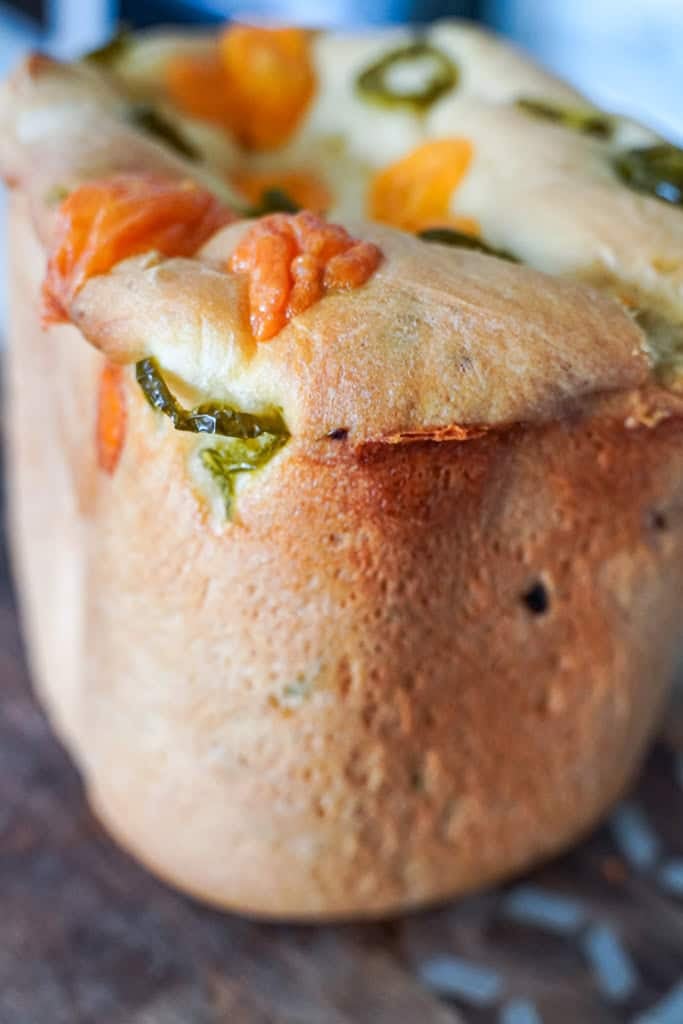 jalapeno cheddar bread loaf on a cooling rack