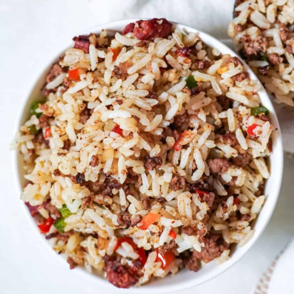 close up of dirty rice in a bowl