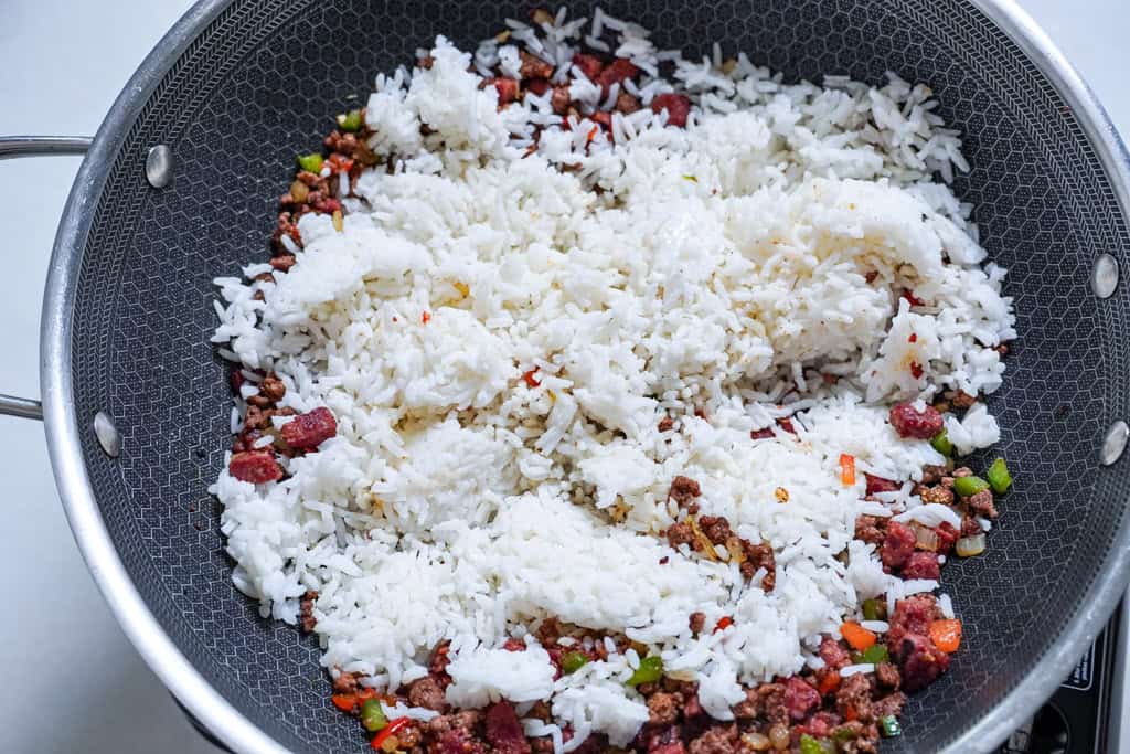 making dirty rice in a skillet