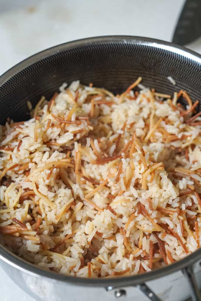 close up of rice pilaf in a pan